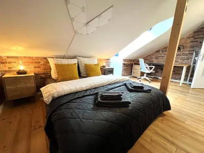 Ein Bett oder Betten in einem Zimmer der Unterkunft Cozy Apartment near city center Dresden by R&L