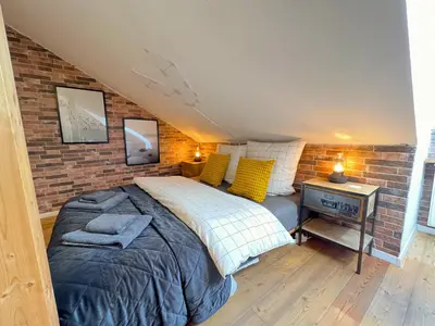 Ein Bett oder Betten in einem Zimmer der Unterkunft Cozy Apartment near city center Dresden by R&L
