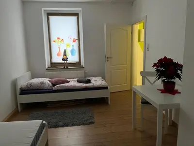 Ein Bett oder Betten in einem Zimmer der Unterkunft Wolke 7
