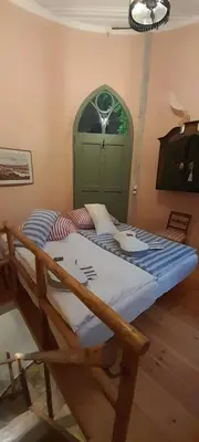 Ein Bett oder Betten in einem Zimmer der Unterkunft Rapunzel trifft Dornröschen