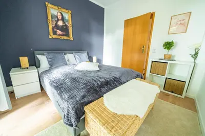 Ein Bett oder Betten in einem Zimmer der Unterkunft FullHouse - Chemnitz - Leonardo Apt - 3 Bedrooms & Balcony