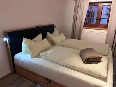 Ein Bett oder Betten in einem Zimmer der Unterkunft Landdomizil Zeißig