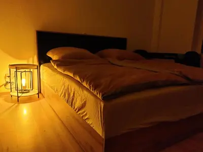 Ein Bett oder Betten in einem Zimmer der Unterkunft Ferienwohnung Obere Aue