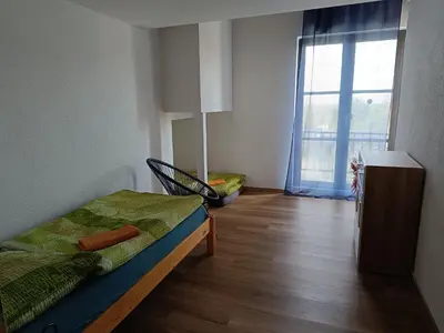 Ein Bett oder Betten in einem Zimmer der Unterkunft Dorfidyll