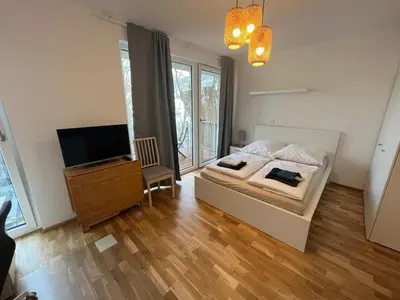 Ein Bett oder Betten in einem Zimmer der Unterkunft New Business Apartment Nr23