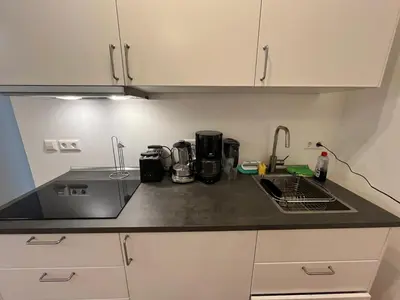 Küche/Küchenzeile in der Unterkunft New Business Apartment Nr.15