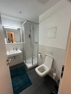 Ein Badezimmer in der Unterkunft New Business Apartment Nr.15