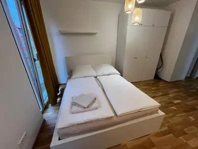 Ein Bett oder Betten in einem Zimmer der Unterkunft New Business Apartment Nr.15
