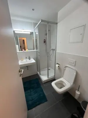 Ein Badezimmer in der Unterkunft New Business Apartment Nr.15
