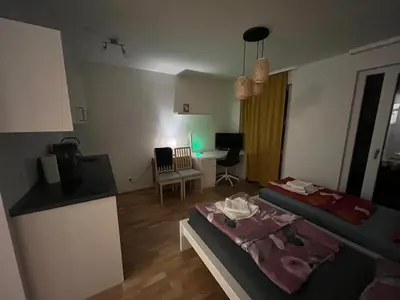 Ein Bett oder Betten in einem Zimmer der Unterkunft New Business Apartment Nr.21