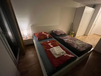 Ein Bett oder Betten in einem Zimmer der Unterkunft New Business Apartment Nr.21