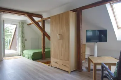 Ein Bett oder Betten in einem Zimmer der Unterkunft Apartment Traumzeit mit Balkon in Vorstadtvilla