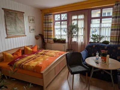 Ein Bett oder Betten in einem Zimmer der Unterkunft Gästehaus Locanda al Castello Stolpen