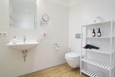 Ein Badezimmer in der Unterkunft Global Living - Design Apartments I City Center I Balcony I Smart-TV I Kitchen I Dresden
