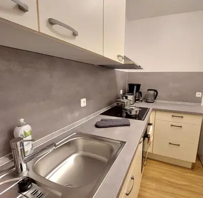 Küche/Küchenzeile in der Unterkunft Moderne Wohnung mit Vollausstattung in ruhiger Lage, W-LAN