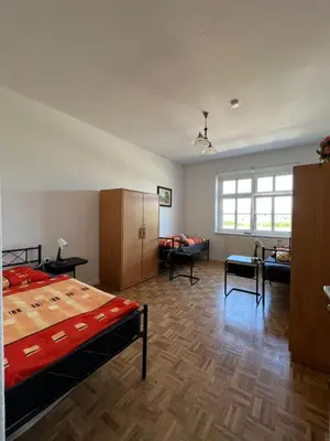 Ein Bett oder Betten in einem Zimmer der Unterkunft Sweet Home Inside Dresden Rooms