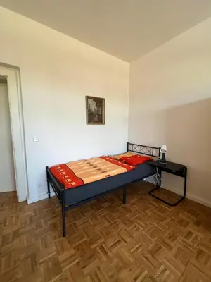 Ein Bett oder Betten in einem Zimmer der Unterkunft Sweet Home Inside Dresden Rooms