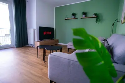 TV/Unterhaltungsangebot in der Unterkunft Design Apartment - Balkon - Induktionskochfeld - Zentral