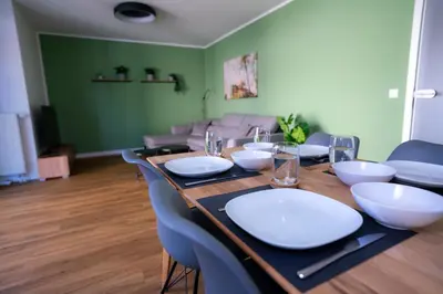 Ein Sitzbereich in der Unterkunft Design Apartment - Balkon - Induktionskochfeld - Zentral