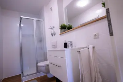 Ein Badezimmer in der Unterkunft Design Apartment - Balkon - Induktionskochfeld - Zentral