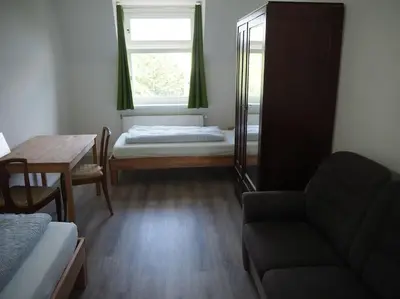 Ein Bett oder Betten in einem Zimmer der Unterkunft TOP 3-Raum Wohnung, für Monteure