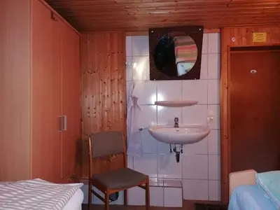 Ein Bett oder Betten in einem Zimmer der Unterkunft Haus am Waldrand