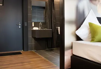 Ein Badezimmer in der Unterkunft OSL Hotel by WMM Hotels
