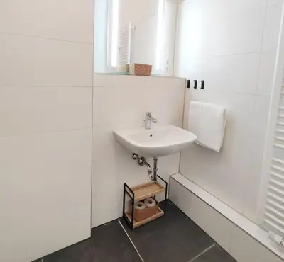 Ein Badezimmer in der Unterkunft tealounge 2 Raum + Küche