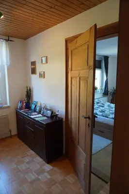 Ein Bett oder Betten in einem Zimmer der Unterkunft Ferienwohnung Ufer - Urlaub in der Sächsischen Schweiz