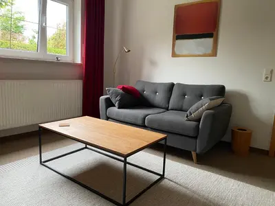 Ein Sitzbereich in der Unterkunft Appartement Am Weinberg