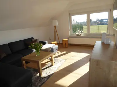 Ein Sitzbereich in der Unterkunft Ferienhaus zwischen den Seen