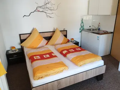 Ein Bett oder Betten in einem Zimmer der Unterkunft Pension Münch 
