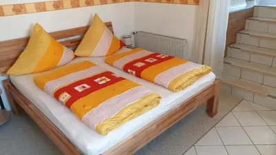 Ein Bett oder Betten in einem Zimmer der Unterkunft Pension Münch 
