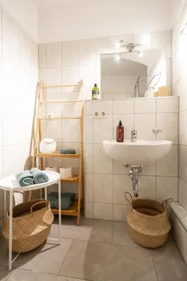 Ein Badezimmer in der Unterkunft TONI 47 - Charming Apartment im idyllischem Villenviertel mit Netflix