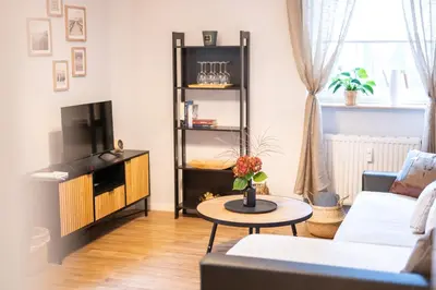 TV/Unterhaltungsangebot in der Unterkunft TONI 47 - Charming Apartment im idyllischem Villenviertel mit Netflix