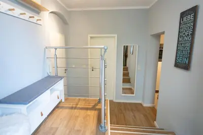 Ein Bett oder Betten in einem Zimmer der Unterkunft TONI 47 - Charming Apartment im idyllischem Villenviertel mit Netflix