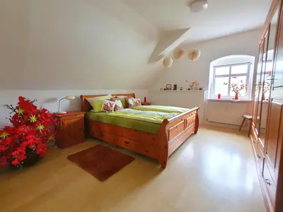Ein Bett oder Betten in einem Zimmer der Unterkunft Rittergut Dornreichenbach
