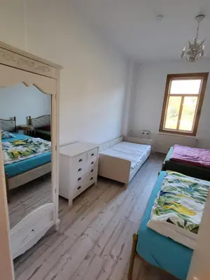 Ein Bett oder Betten in einem Zimmer der Unterkunft Ferienwohnungen Königstein