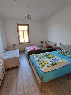 Ein Bett oder Betten in einem Zimmer der Unterkunft Ferienwohnungen Königstein