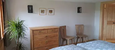 Ein Bett oder Betten in einem Zimmer der Unterkunft Ferienhaus FERGUNNA direkt am Kammweg mit Sauna