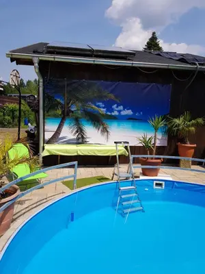 Der Swimmingpool an oder in der Nähe von Ferienwohnung an der Kurpromrnade