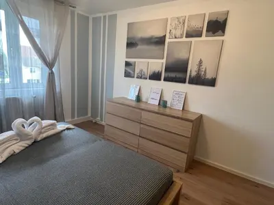 Ein Bett oder Betten in einem Zimmer der Unterkunft Ferienwohnung Frühauf Rochlitz
