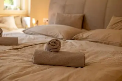 Ein Bett oder Betten in einem Zimmer der Unterkunft Innenstadt Appartement *Garten*