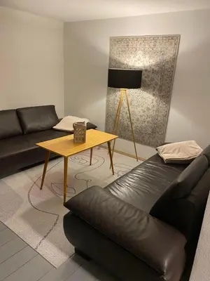Ein Sitzbereich in der Unterkunft Familien-Ferienhaus am Felsenlabyrinth