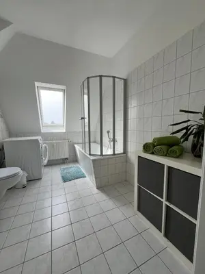Ein Badezimmer in der Unterkunft 1 Raum Dachgeschosswohnung in ruhiger Lage