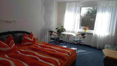 Ein Bett oder Betten in einem Zimmer der Unterkunft Pension Füg