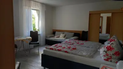 Ein Bett oder Betten in einem Zimmer der Unterkunft Pension Füg