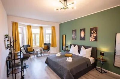 Ein Bett oder Betten in einem Zimmer der Unterkunft Loh9 - Das Apartment im Citycenter - Parkplatz - Wlan - Aufzug