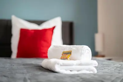 Ein Bett oder Betten in einem Zimmer der Unterkunft Loh9 - Das Apartment im Citycenter - Parkplatz - Wlan - Aufzug