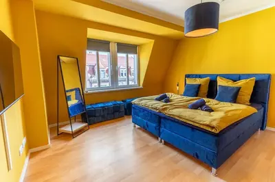 Ein Bett oder Betten in einem Zimmer der Unterkunft Penthouse Apartment Pirna 6 Personen, WLAN, Waschmaschine